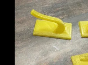 крючёк для держателя крышек 