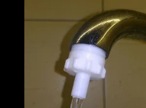 Штуцер на водопроводный кран