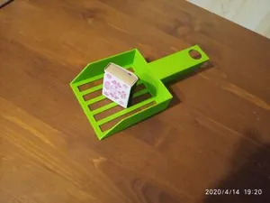 Просто совок для кошачьего туалета...
