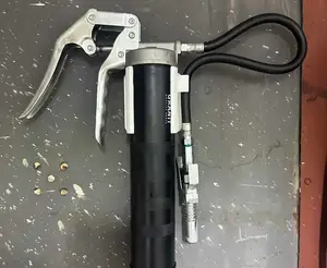 Holder for grease gun