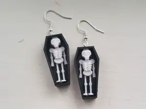 skeleton in coffin earring