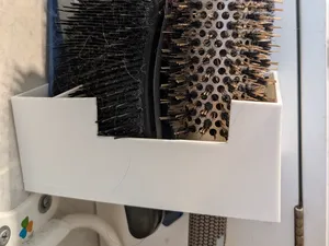 Hairbrush wall holder