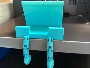 Phone Stand With Articulated Legs