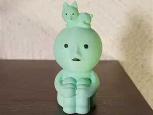 Smiski with cat on his head