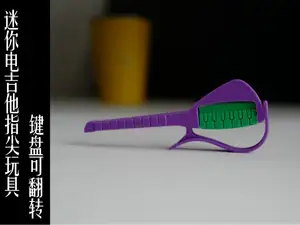 迷你指尖电吉他玩具(键盘可以翻转)