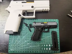 格洛克19X缩比幼崽可发射皮筋钥匙扣挂件65g一盘出