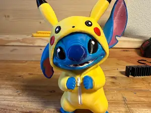 Stitch in Pikachu Costume