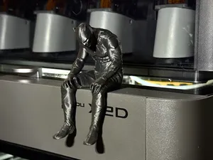Sad Black Panther sitting on a ledge Figurine!