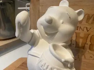 pooh with honey jar 