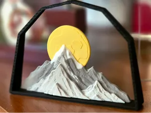 Sunlit Mountain Peaks