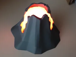 Erupting volcano diorama with glowing lava