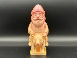 Carved Santa on a Bear Figurine