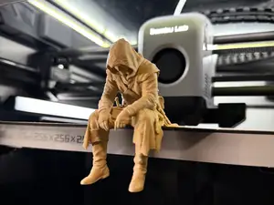 Sad Assassin's Creed sitting on a ledge Figurine