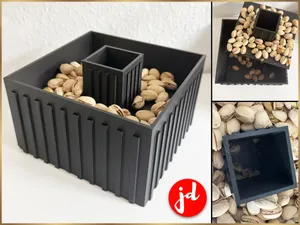Nussschale mit Abfallbehälter