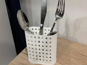Modern White Cutlery Drainer with Teardrop Pattern