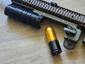 Airsoft underbarrel grenade launcher