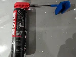 Motorcycle chain lube applicator