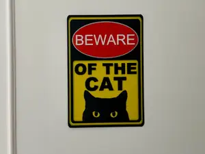 Warning Sign: 'BEWARE OF THE CAT'