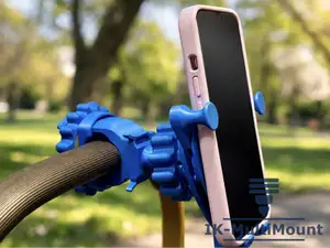 Self-locking gravity phone holder with ball joint