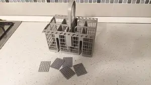 Grid for dishwasher cutlery basket