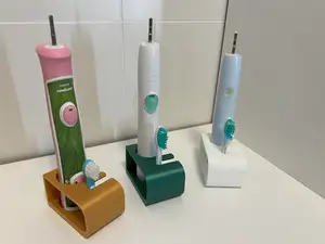 Electric toothbrush holder/stands in three sizes