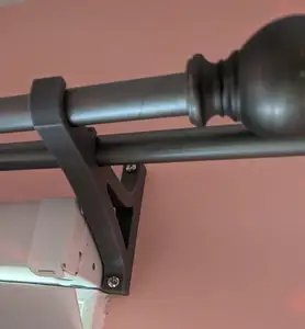 Dual curtain rod holder