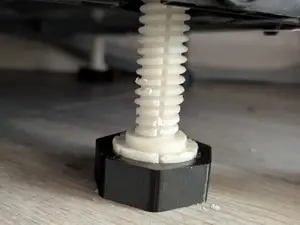 Dishwasher lifting foot