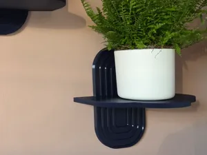 Modern decorative wall shelf with mounting holes