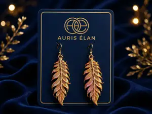 Auris Élan Golden Feather Earrings