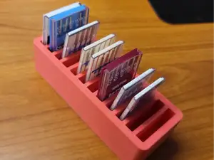 Sewing machine needle box
