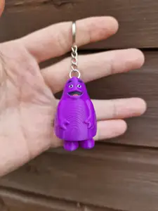 Articulated Grimace Hidden Legs Keychain