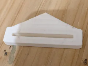 Ergonomic toothpaste squeezer