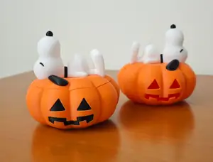 Pumpkin Bowl with Snoopy sleeping on top as lid
