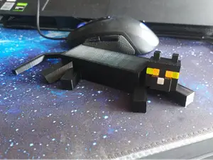Minecraft lying cat (with holes for eyes and nose)