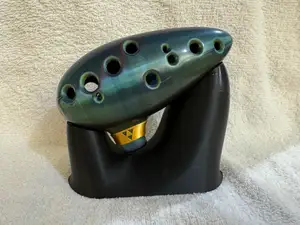 12 Hole Ocarina with "Legend of Zelda - Ocarina of Time" inspired Collar. Includes Organic stand.