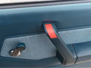 Nissan/ Datsun 720 door handle screw hole plug