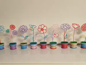 Blume im Topf bunt