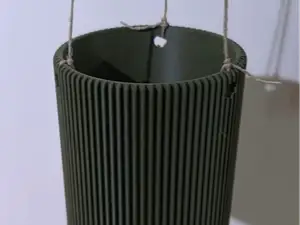 Hanging ribbed planter with built in driptray