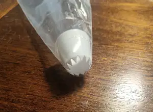 Piping bag tip