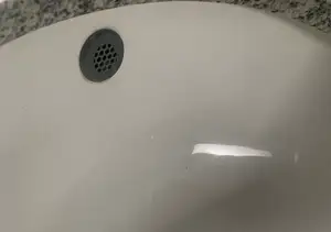 Bathroom sink overflow plug