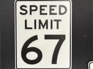 67 Speed Limit sign