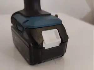 Makita battery button