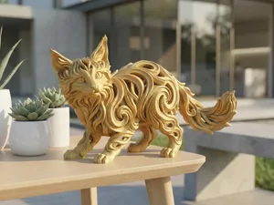 Escultura de gatito maine coon juguetón