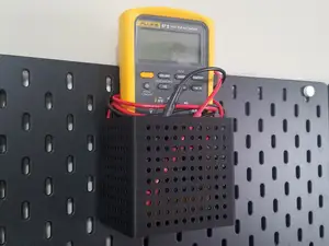 Skadis Large Container holds Fluke 87V Multimeter