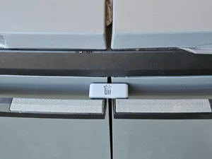 Blocca porta per cestino rifiuti