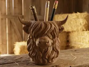Noble Highland cow: Your Shaggiest Desk Guardian
