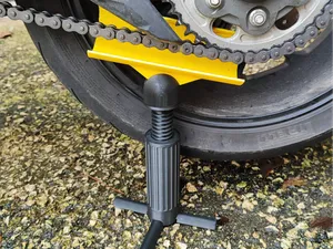 Pied de protection graissage chaine moto