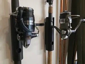Wall bracket for fishing rod