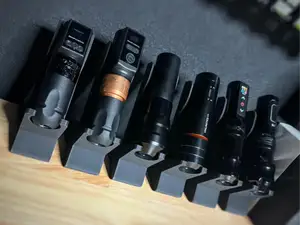 Tattoo gun/machine holder for display with magnets