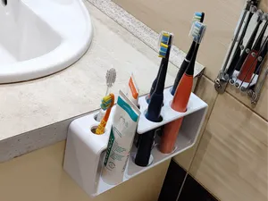 Toothbrush holder spacesaver - hanger
